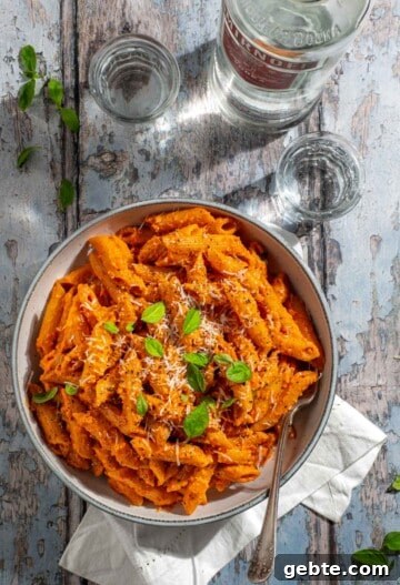Top Pasta Recipes to Make Tonight 9 Gigi Hadid pasta in a bowl next to a bottle of vodka.