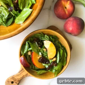 Spinach salad with peaches and dates