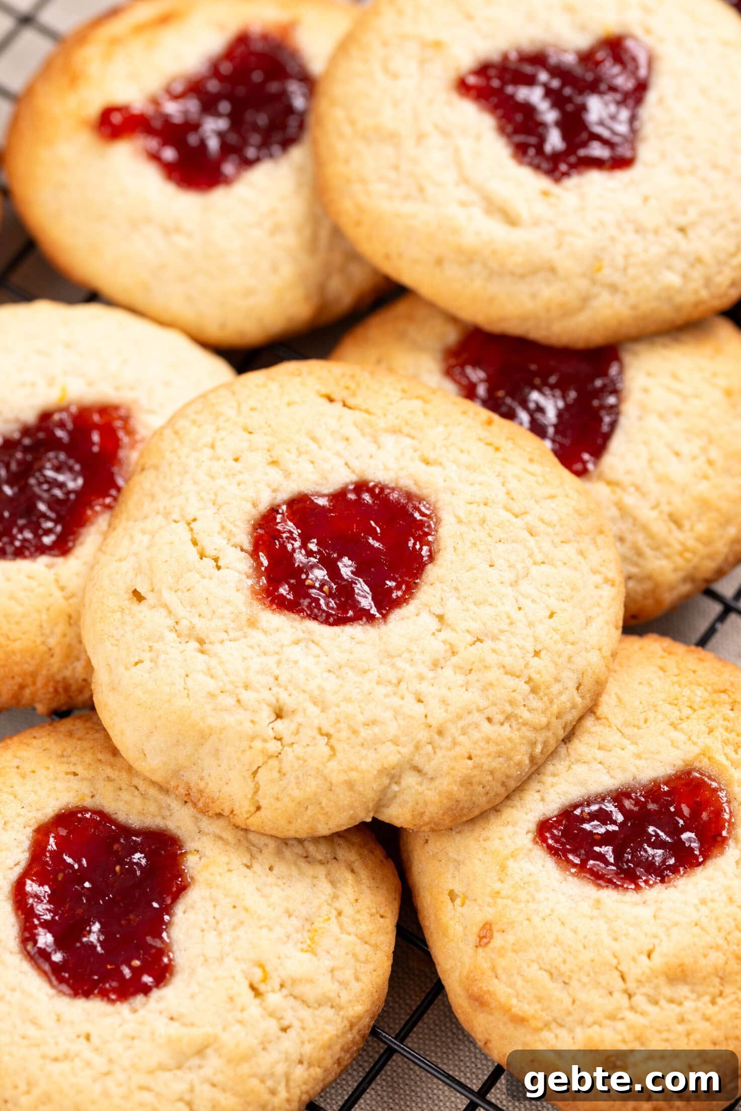 An overhead image of strawberry lemonade cookies arranged on top of each other.