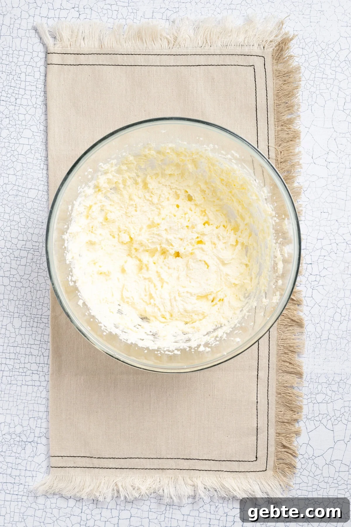 An image of adding dry ingredients to the mixing bowl.