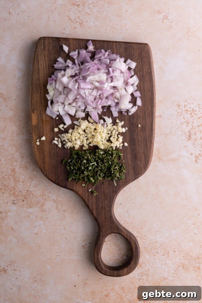 Prepping shallots, garlic, and rosemary