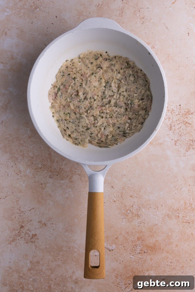 Forming a roux to thicken Shallot Cream Sauce.