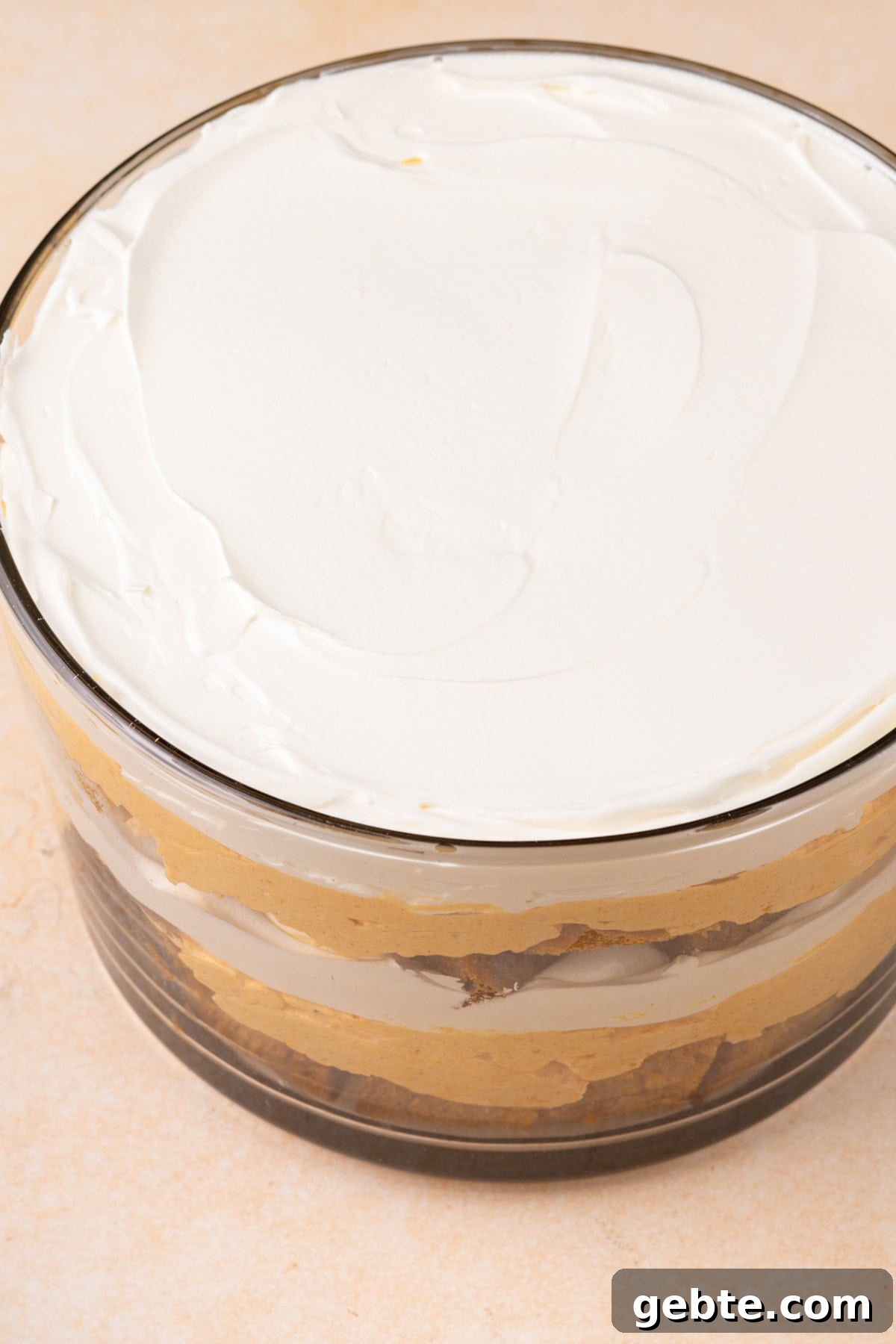 Fully layered pumpkin trifle ready to chill in the fridge.