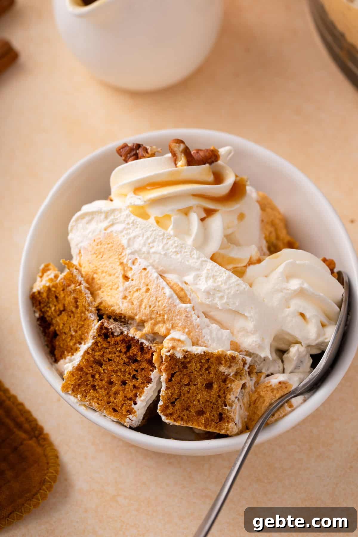 Serving of pumpkin trifle in a white bowl.