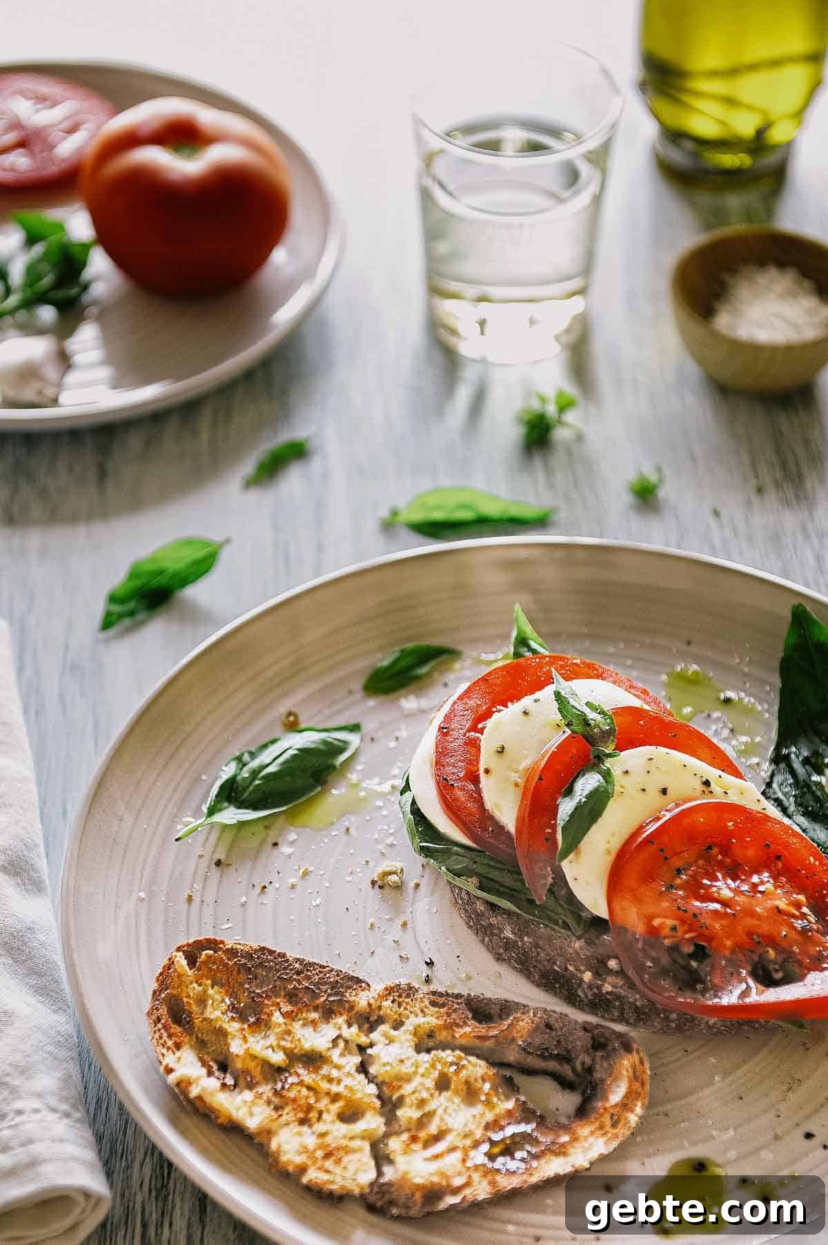 Caprese Bruschetta Recipe: Fresh Tomato, Basil & Mozzarella Toast 8 plated caprese bruschetta ready to serve.