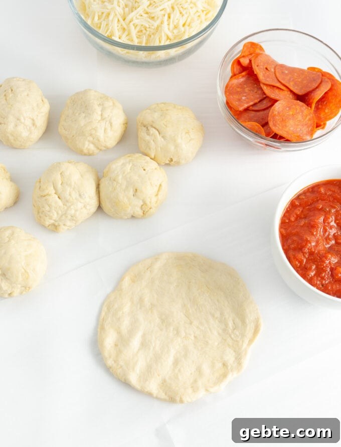 rolling dough into 8 balls and flattening into thin crusts