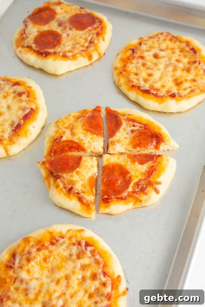 mini pepperoni pizza cut into four slices