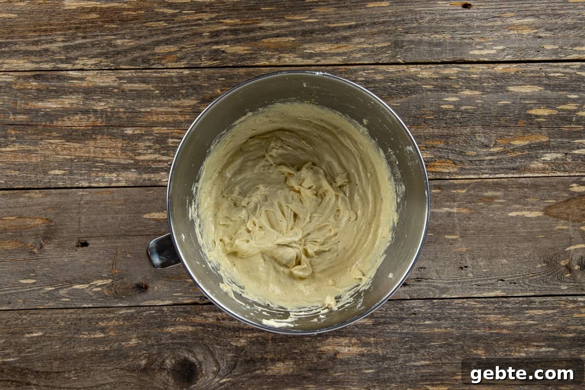 Batter in stainless steel mixing bowl.
