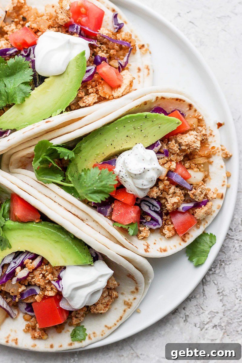 Quinoa and Tofu Taco Filling Recipe for Meatless Tacos 3 3 tortillas filled with vegan taco meat and fresh veggies