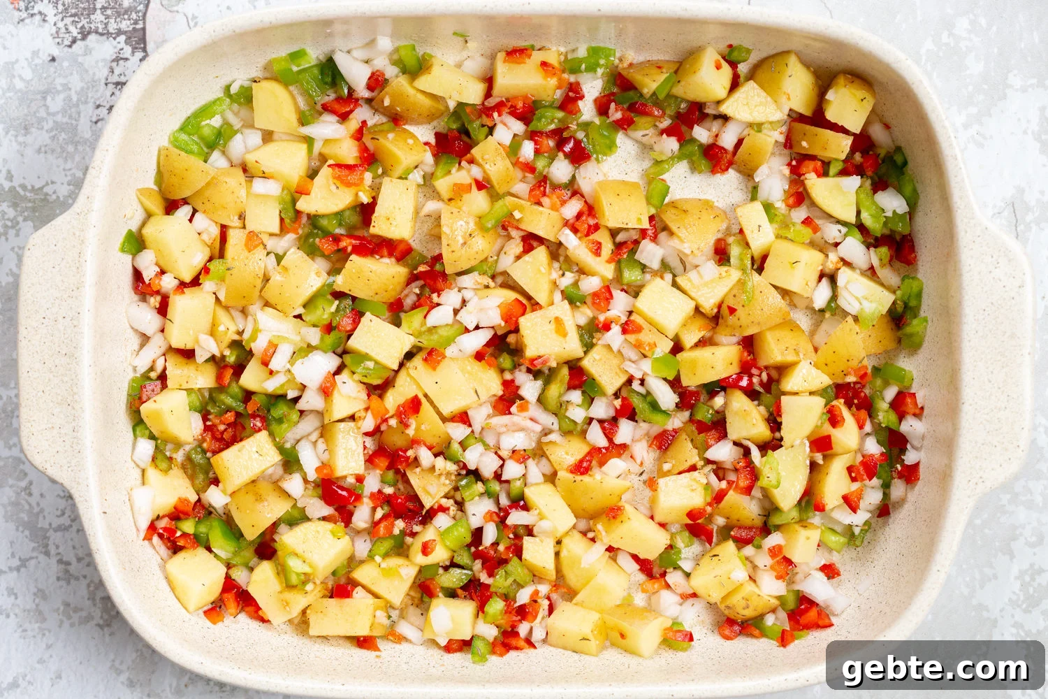 Mung Bean Egg Vegan Omelet: Fluffy Plant-Based Breakfast 13 Breakfast Potatoes in a white baking dish