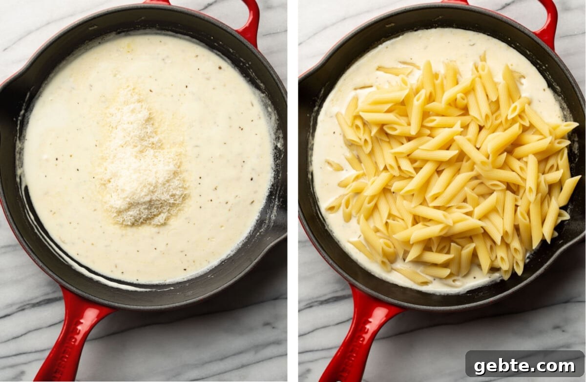 adding parmesan to a skillet with creamy garlic sauce then tossing with penne
