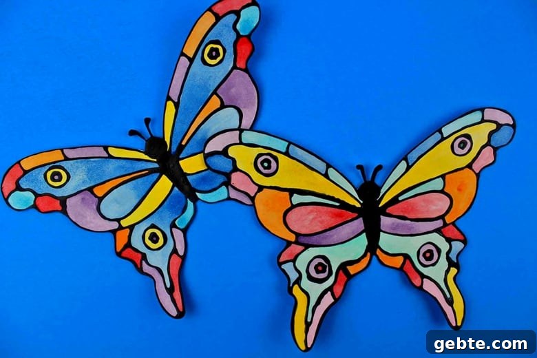 How to make a faux stained-glass butterfly craft using cardstock, glue, watercolors, and the provided printable butterfly template.