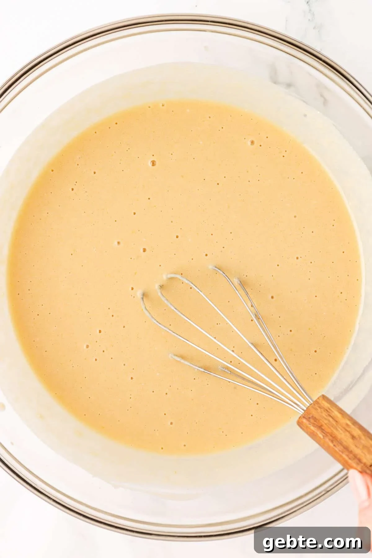 Moist Greek Yogurt Snack Cake with Lemon Glaze 8 wet ingredients whisked together