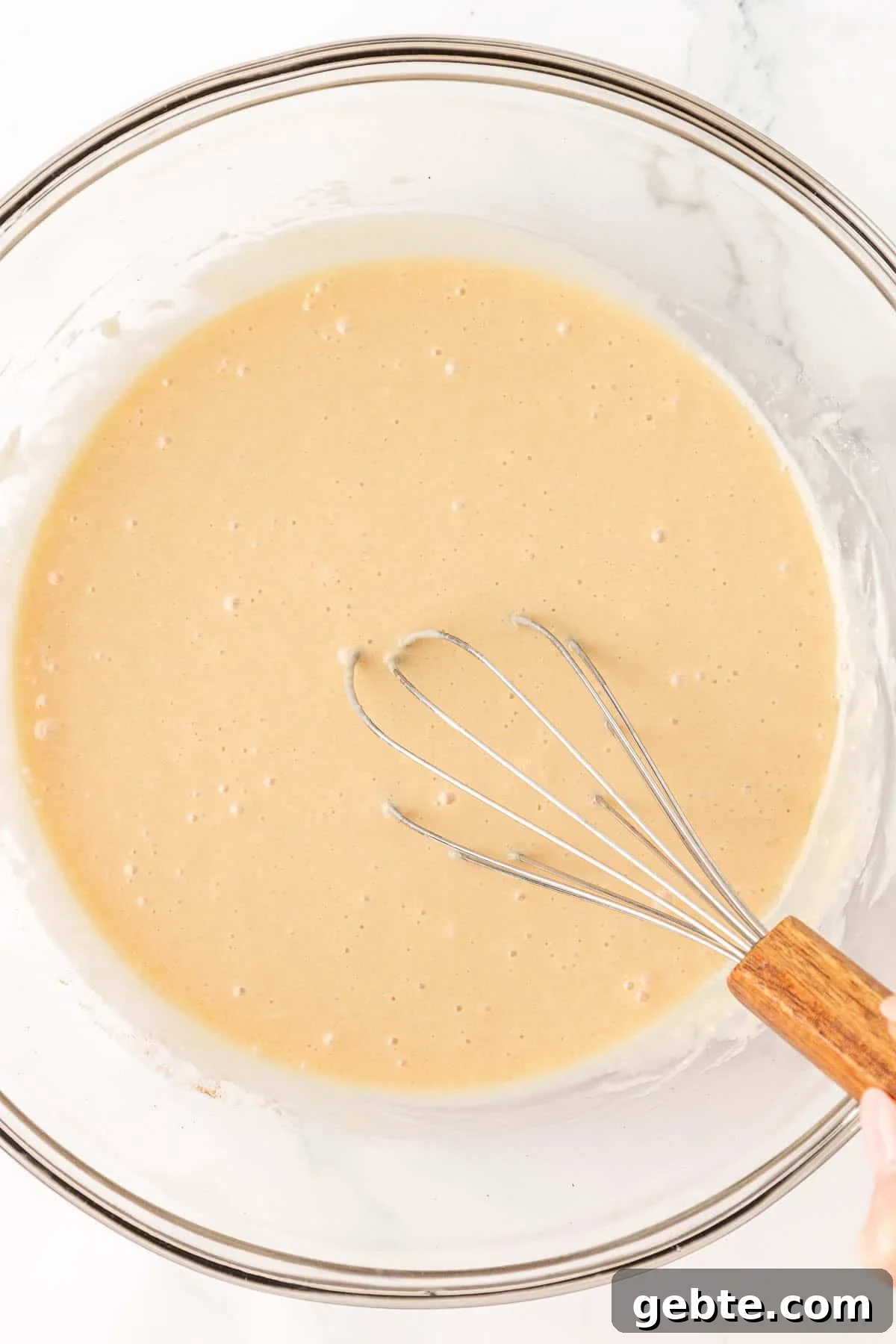 Moist Greek Yogurt Snack Cake with Lemon Glaze 10 wet ingredients whisked together