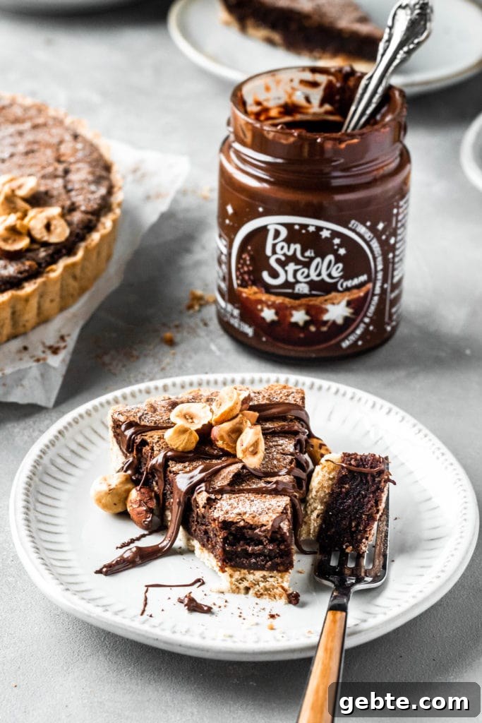 hazelnut brownie tart slice pan di stelle