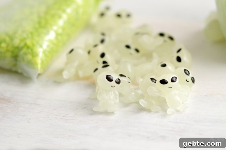 Make Your Own Alien Nightlight: DIY Guide for Cool Space Decor 3 Glow-in-the-dark aliens and bright green paint for the mason jar nightlight.