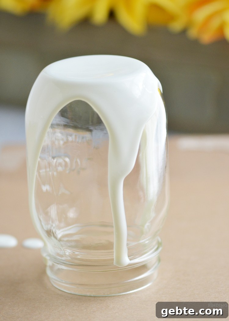 Make Your Own Alien Nightlight: DIY Guide for Cool Space Decor 6 Painted mason jar drying into a glowing alien nightlight.