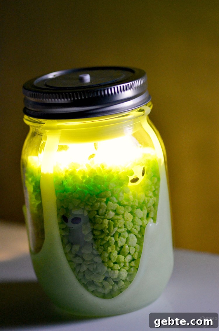 Make Your Own Alien Nightlight: DIY Guide for Cool Space Decor 9 Mason jar nightlight illuminated with green glow and LED light.
