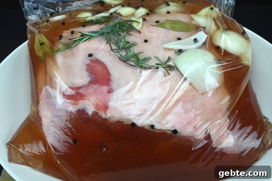 How to Smoke Pork Shoulder (Pork Butt) to Tender Perfection 4 A pork butt in a simple pork brine.