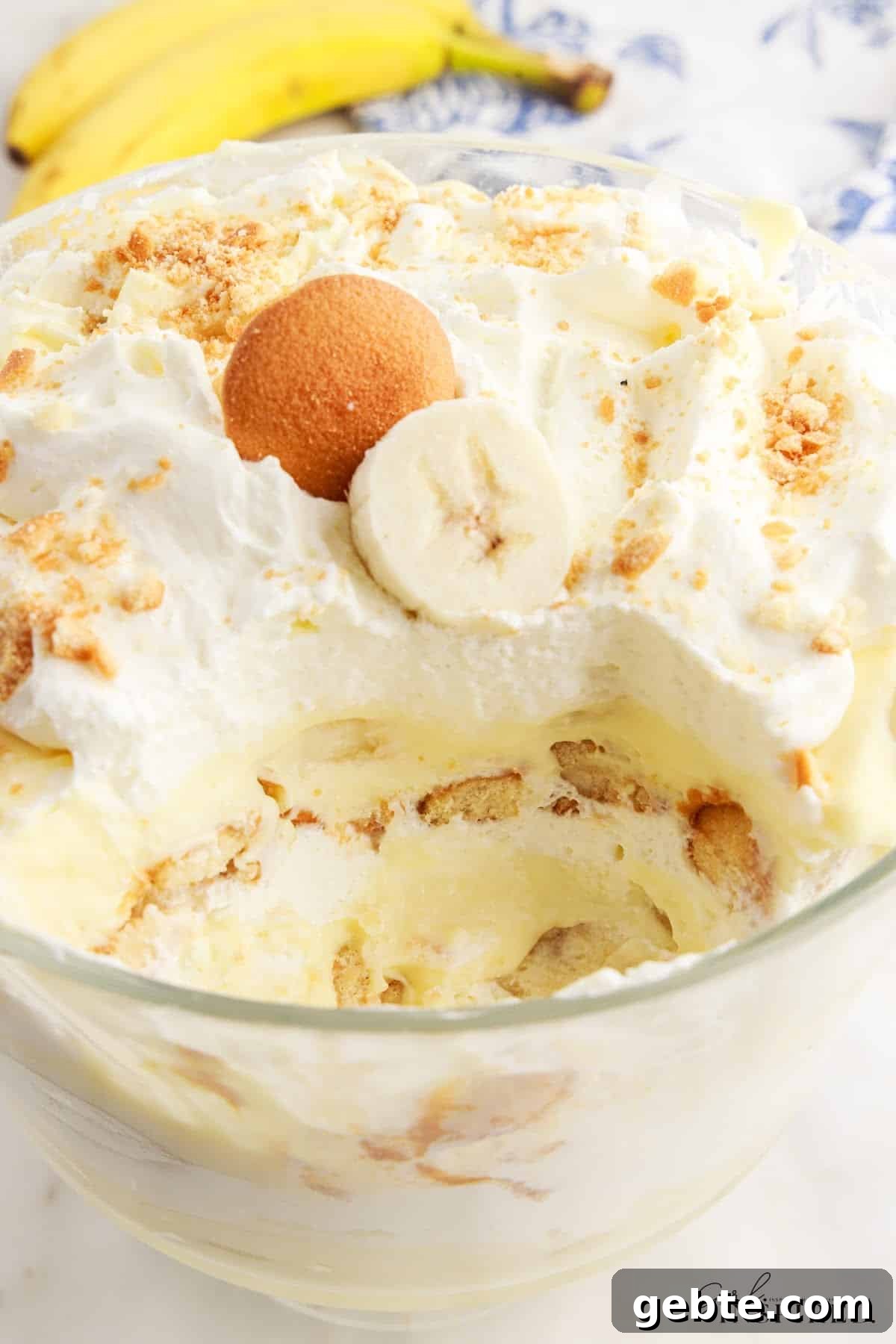 Creamy Banana Pudding Trifle Recipe for Parties and Potlucks 11 Banana Pudding Trifle with a serving missing.