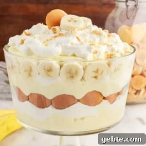 Creamy Banana Pudding Trifle Recipe for Parties and Potlucks 17 Pudding, whipped cream, Nilla wafers, and fresh banana slices layered in a banana pudding trifle.
