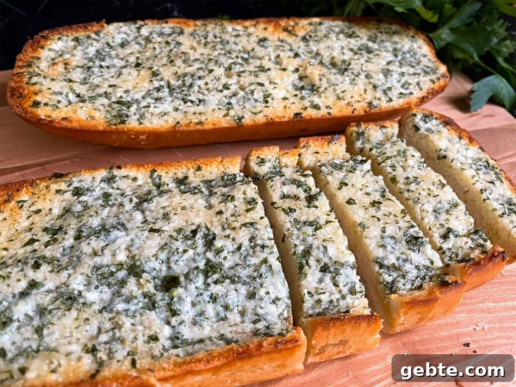Garlic bread on a cutting board.