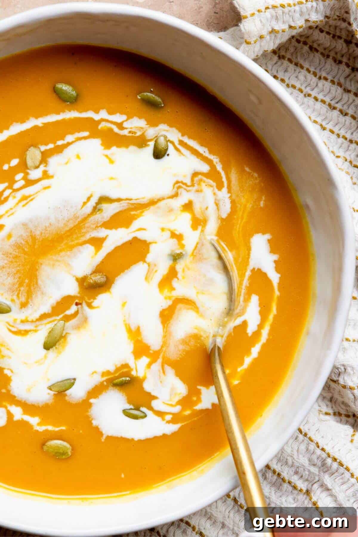 Creamy Carrot & Butternut Squash Soup Recipe for Fall Nights 2 Creamy one-pot carrot and butternut squash soup with coconut milk and pumpkin seed.