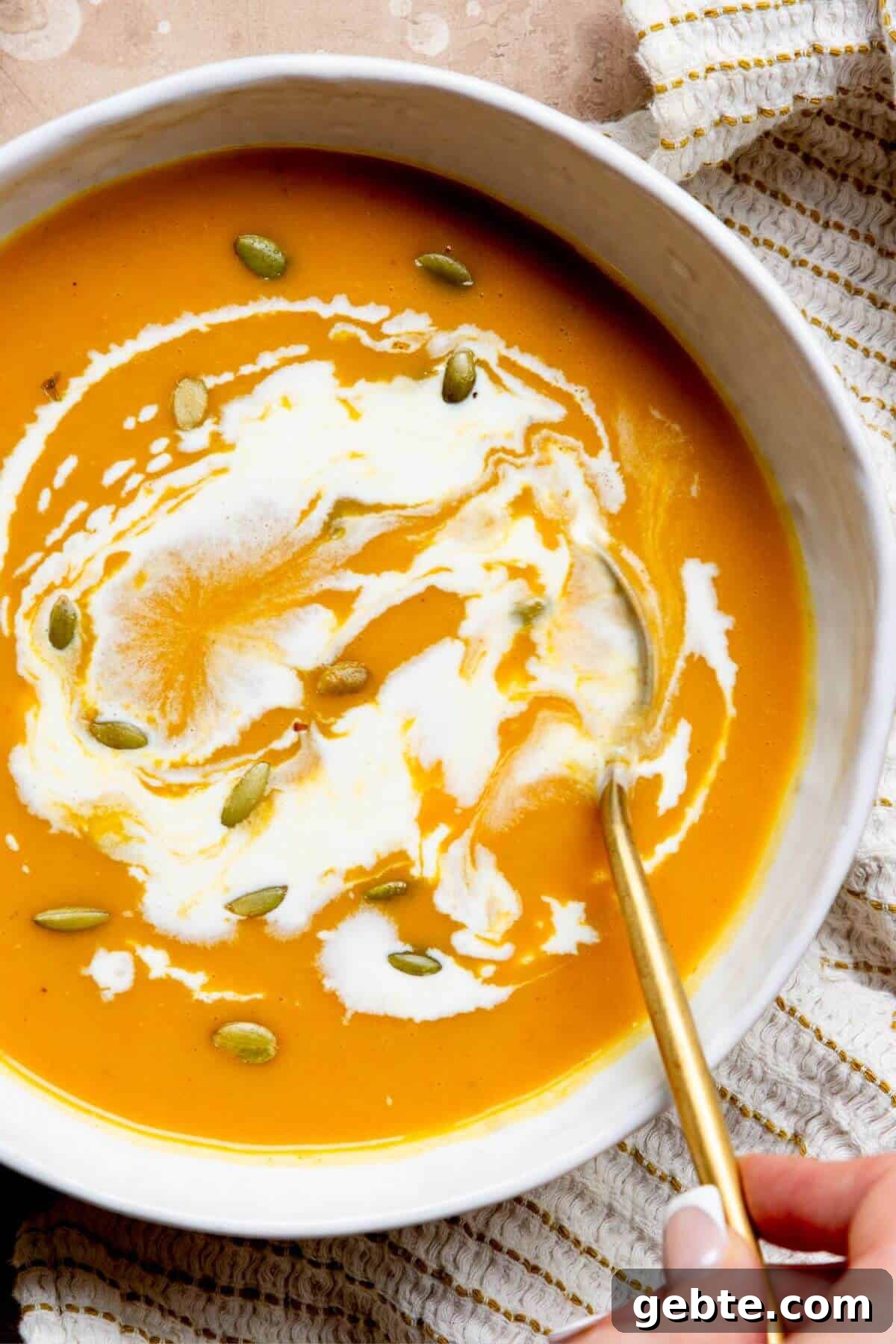 Creamy Carrot & Butternut Squash Soup Recipe for Fall Nights 13 One-pot, vegan carrot and butternut squash soup, finished with a swirl of coconut milk on top.