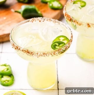 spicy margaritas in 2 glasses