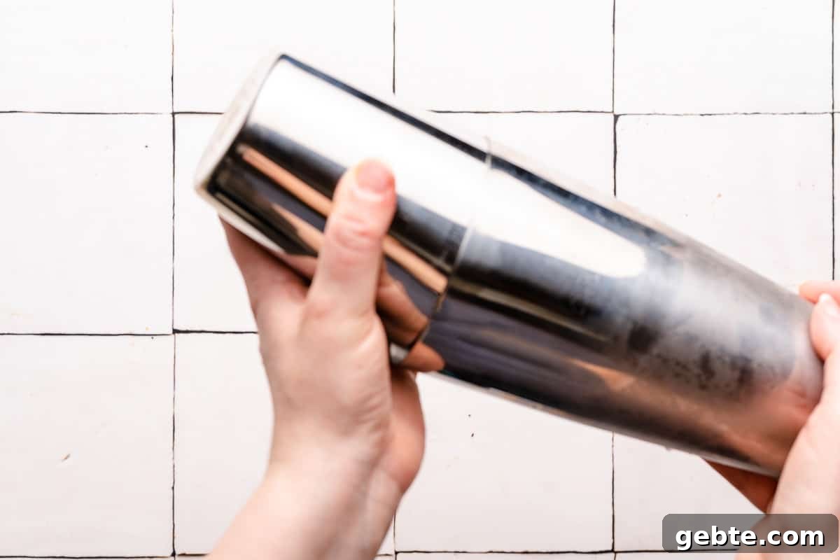 cocktail shaker in hands