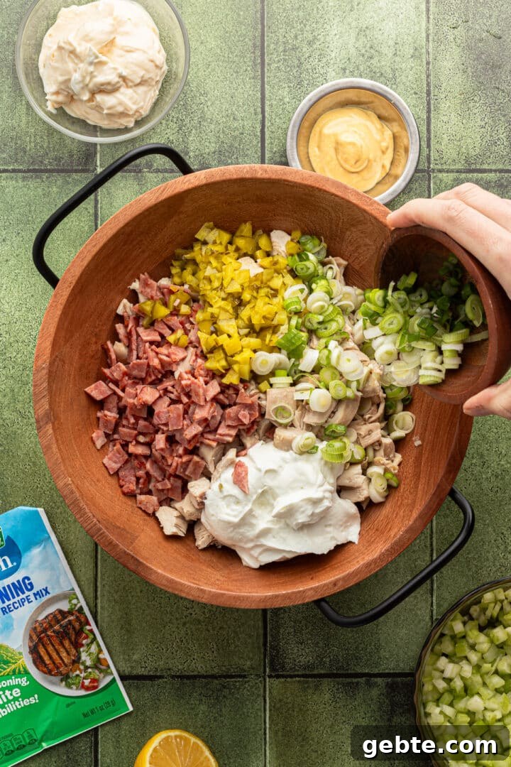 Creamy Ranch Chicken Salad Recipe for Lunch or Meal Prep 4 Ingredients for ranch chicken salad in a large wooden bowl