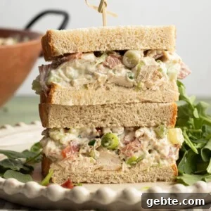Creamy Ranch Chicken Salad Recipe for Lunch or Meal Prep 7 Ranch chicken salad in a sandwich, sliced in half.