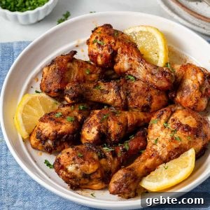 air fried chicken legs with lemon slices