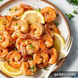 air fryer shrimps with a fork