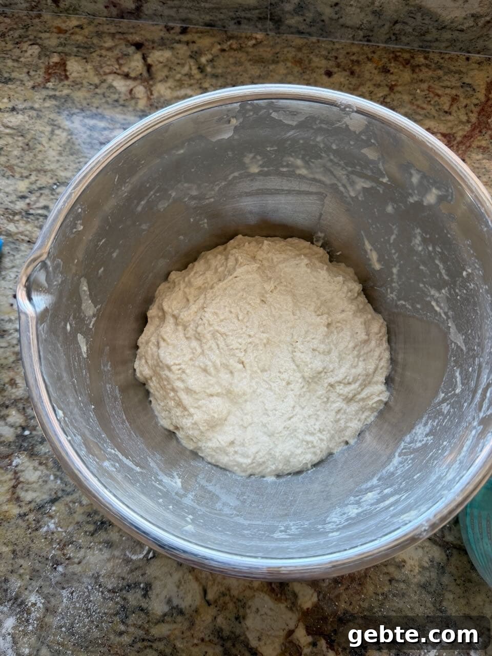 Sourdough Schedule for Beginners: Fit Baking into Your Daily Routine 3 Bowl of just mixed sourdough sitting on a countertop.