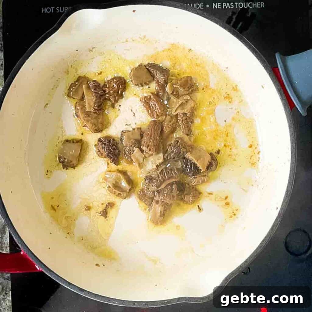 Sautéing sliced morel mushrooms in olive oil in a skillet over medium heat until they are tender.