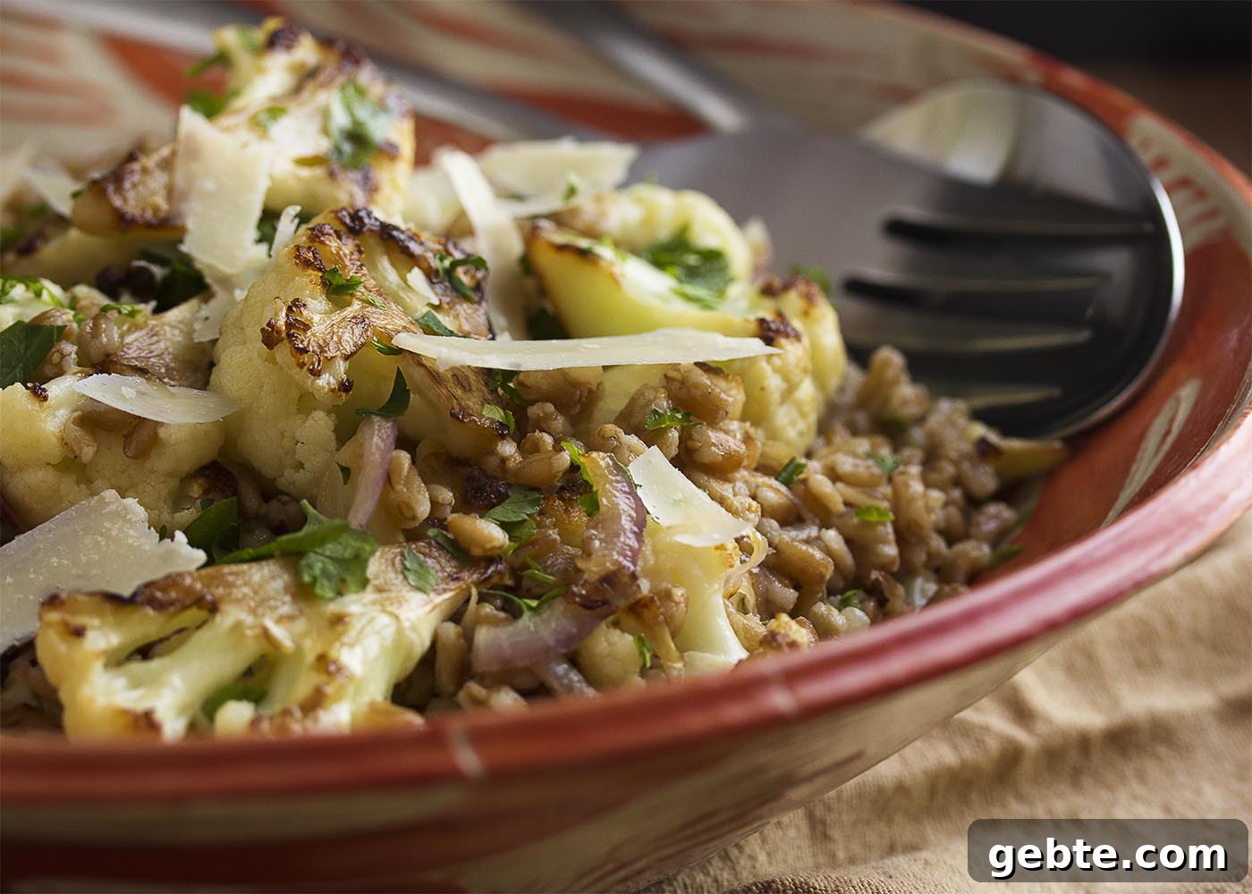 Close up of Mediterranean farro salad with cauliflower and tahini dressing