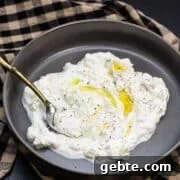 Top Mexican-Inspired Recipes for Cinco de Mayo Celebration 3 Bowl of tzatziki with olive oil drizzled over the top.