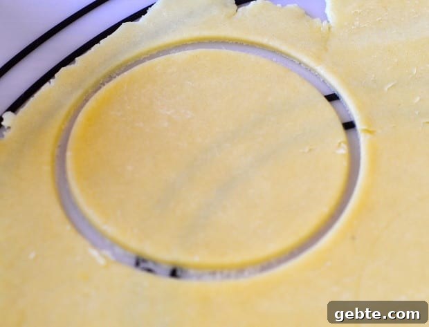 boureka dough scored with a circle from a glass