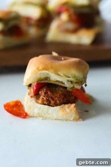 one turkey burger slider with roasted red peppers