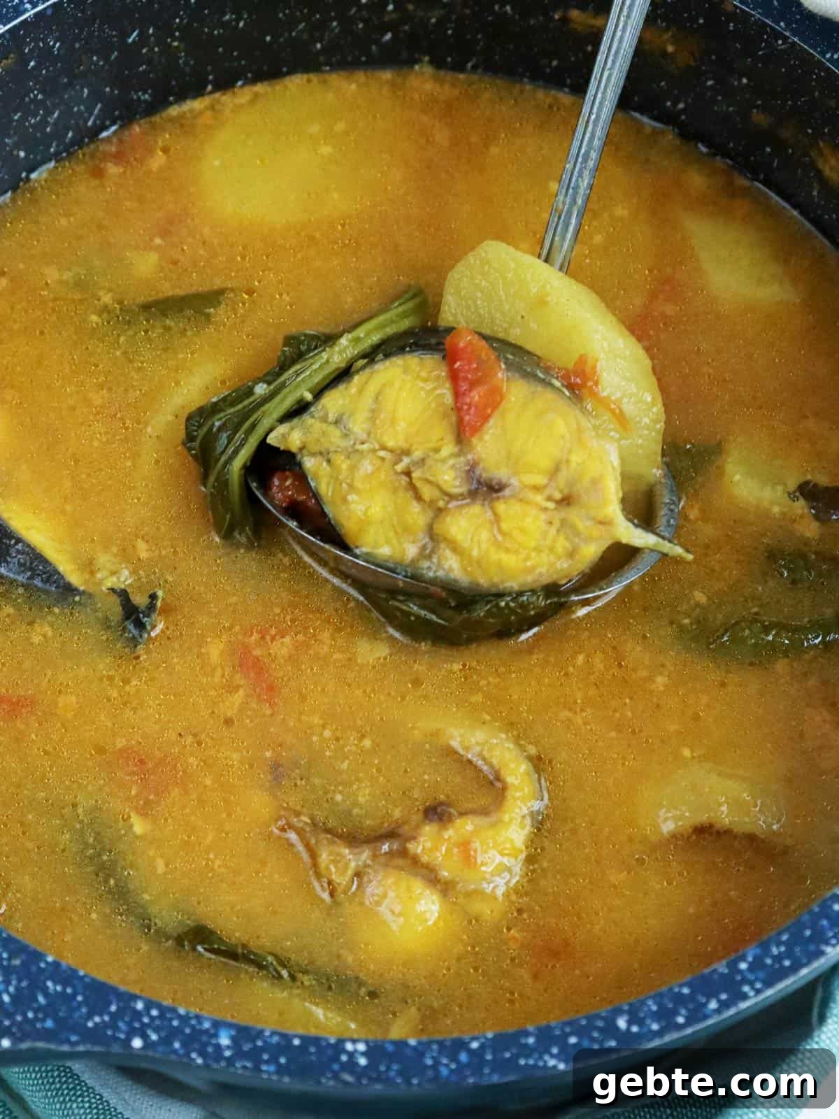 sinigang na hito in a pot