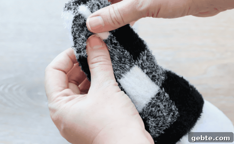 Sock tied with rubber band.