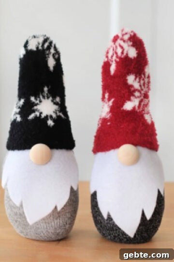 Two sock gnomes on a table.