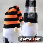 Two sock gnomes on a table.