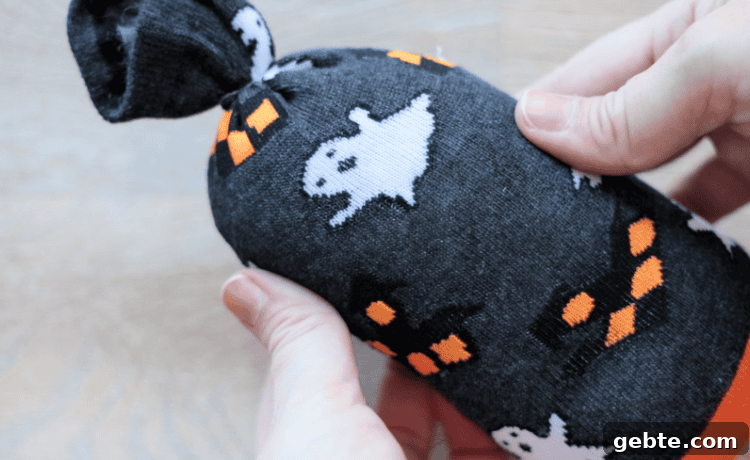 Halloween sock stuffed with rice and pillow stuffing.