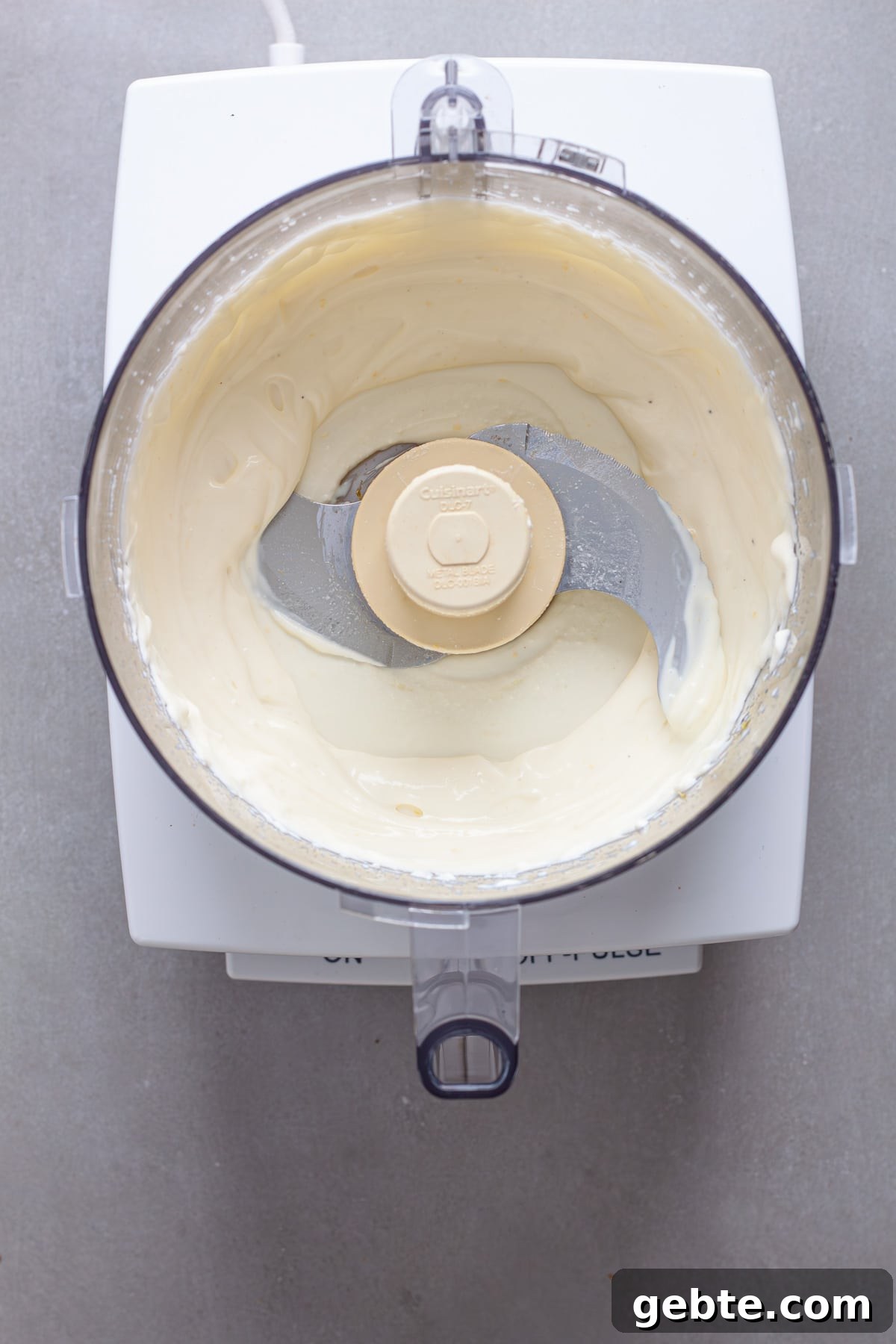 Whipped ricotta cheese in a food processor.