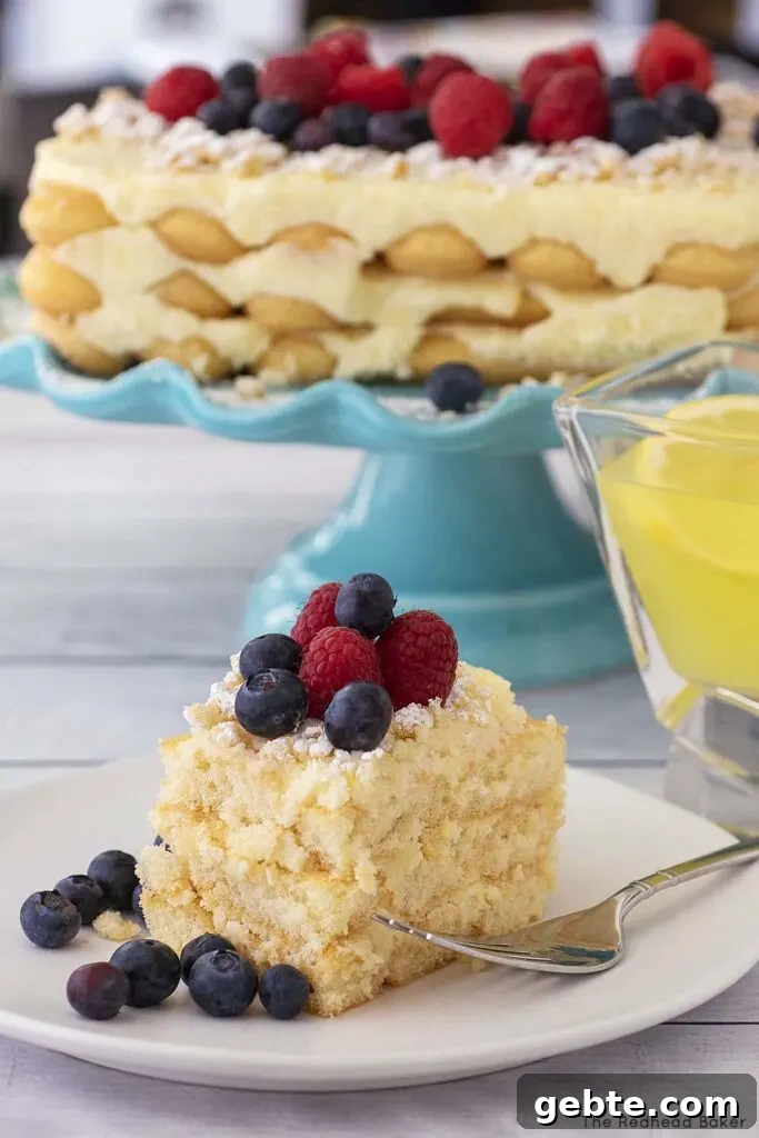 Limoncello Tiramisu Recipe: Bright Citrus Italian Dessert 5 A slice of tiramisu with a shot glass of lemoncello
