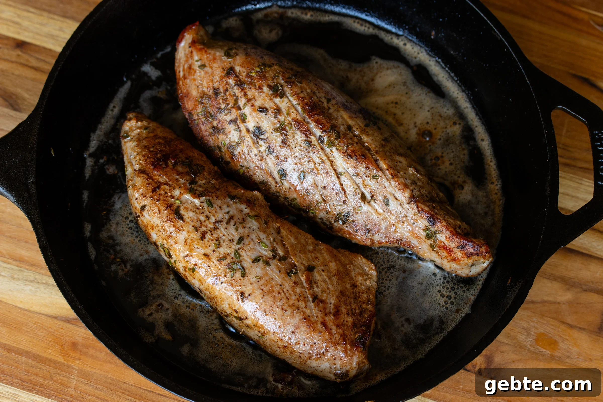 Roasted Pork Tenderloin with Caramelized Apples and Sage 6 The tenderloin seared in the pan.