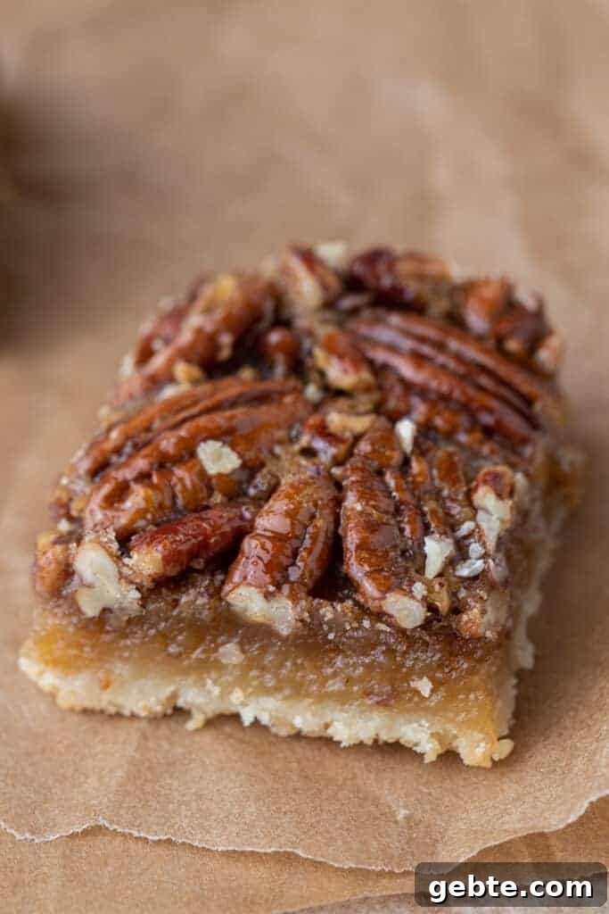 Slice of pecan pie bar