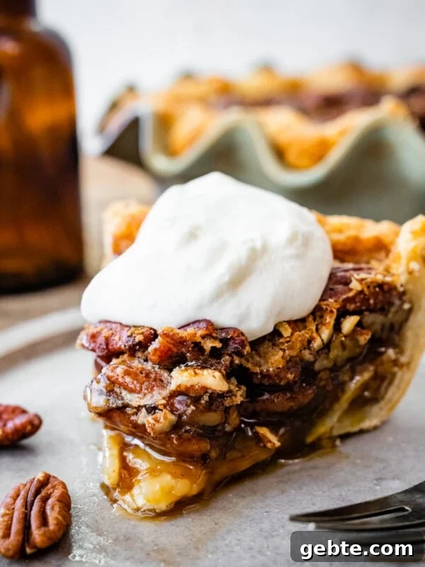 Hearty Turkey Shepherd's Pie Recipe for Comforting Weeknight Dinners 18 Slice of maple pecan pie topped with whipped cream.